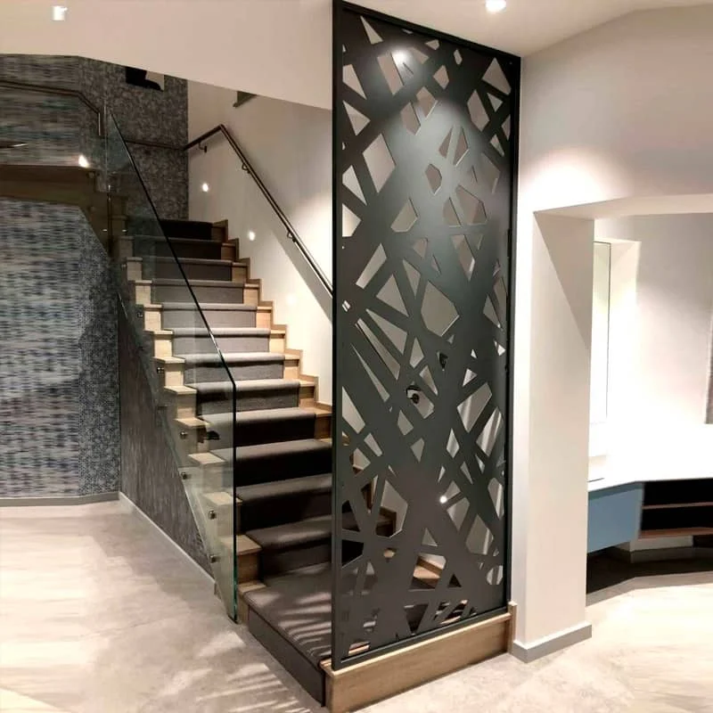 Decorative laser-cut aluminum privacy screen panels and integrated landscape water wall